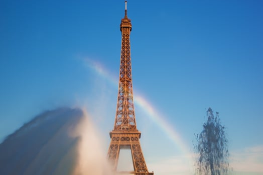 Eiffel Tower seen from fountain making natural rainbow, Paris, France photo