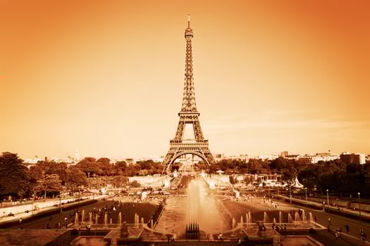 Eiffel Tower and fountain, Paris, France. Vintage, monochrome gold photo