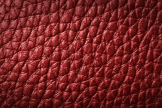 Genuine red leather background, pattern photo