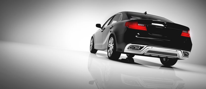 Back of black luxury car on white background. photo