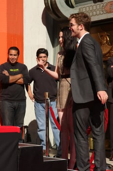 LOS ANGELES, NOV 3 - Robert Pattinson, Kristen Stewart at the Handprint and Footprint Ceremony for the Twilight Saga Actors at Grauman s Chinese Theater on November 3, 2011 in Los Angeles, CA photo