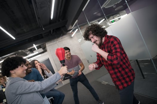 multiethnics business team boxing at office photo
