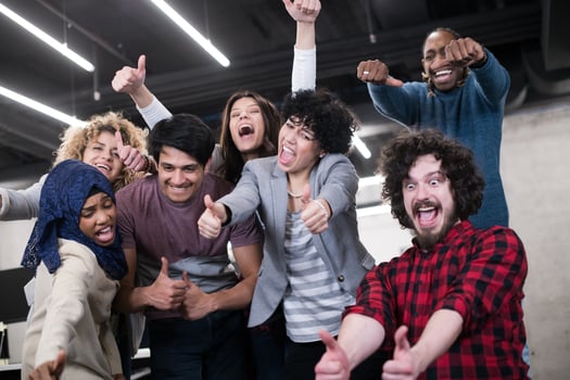 portrait of young excited multiethnics business team photo