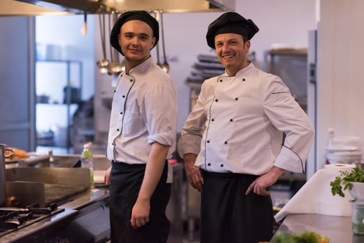 Portrait of two chefs photo