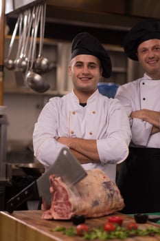 Portrait of two chefs photo