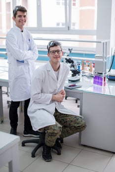Group of young medical students doing research photo