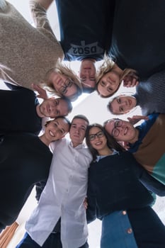 students celebrating successfully finished project photo