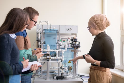 young students doing practice in the electronic classroom photo