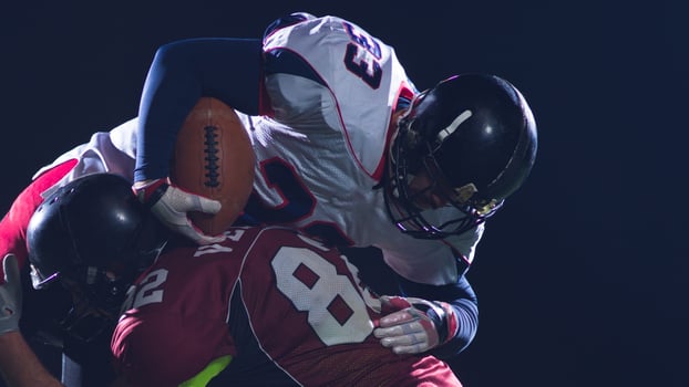 American football players in action photo
