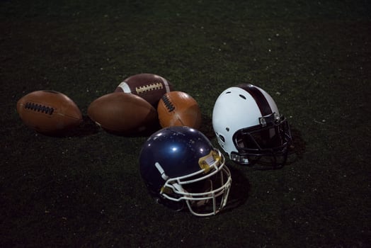 american football and helmets photo
