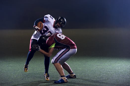 American football players in action photo