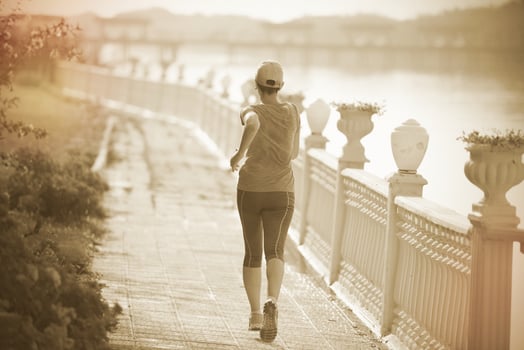 Runner on sidewalk photo