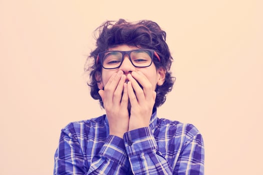 portrait  of smart looking arab teenager with glasses photo