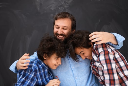 happy father hugging sons unforgetable moments of family joy in mixed race middle eastern arab family photo