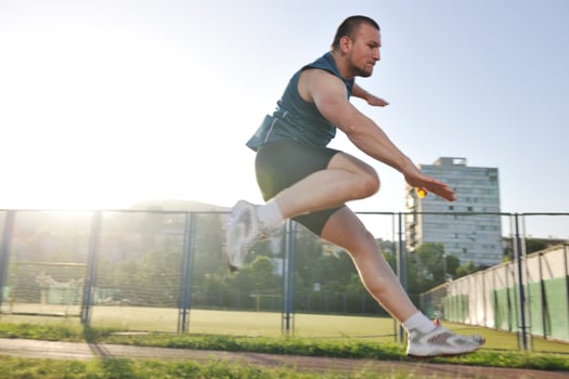 young athlete running photo
