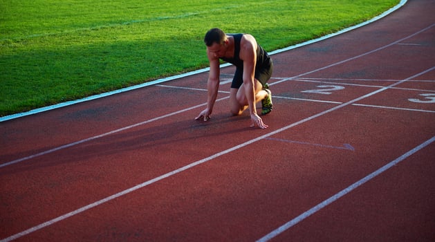 Athletic man start photo