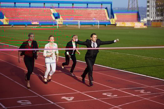 business people running on racing track photo