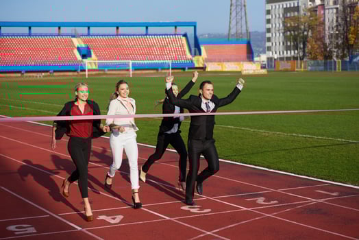 business people running on racing track photo