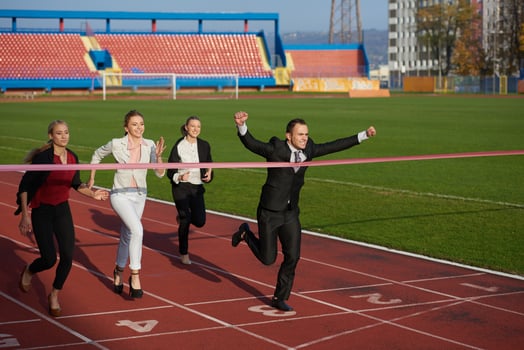 business people running on racing track photo