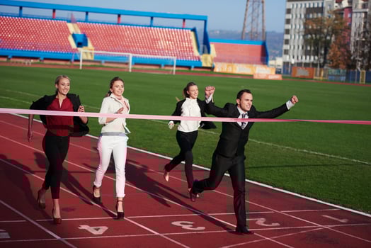 business people running on racing track photo