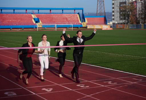 business people running on racing track photo