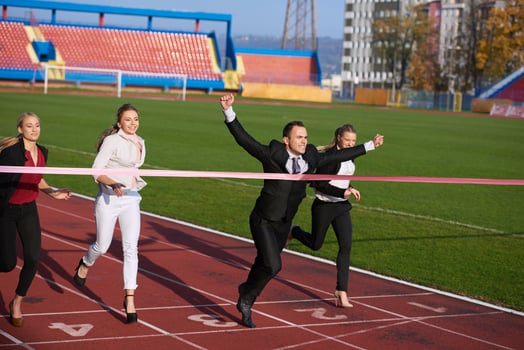 business people running on racing track photo