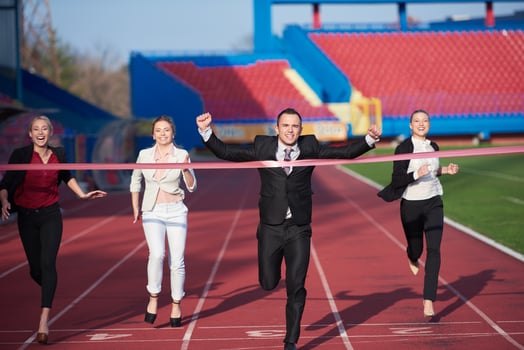business people running on racing track photo