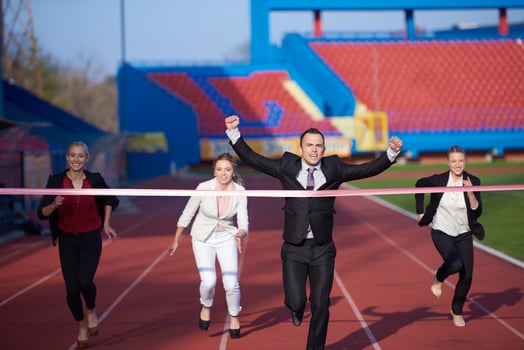 business people running on racing track photo