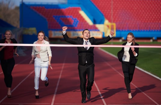 business people running on racing track photo