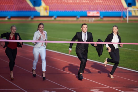 business people running on racing track photo