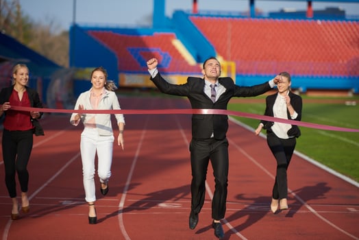 business people running on racing track photo