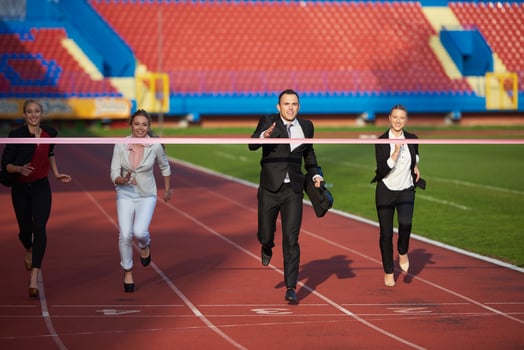business people running on racing track photo