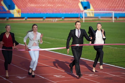 business people running on racing track photo