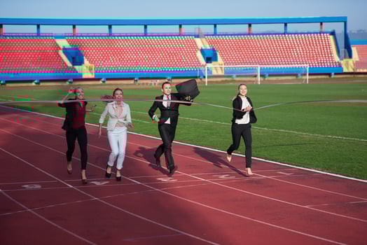 business people running on racing track photo