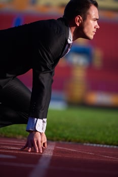 business man ready to sprint photo