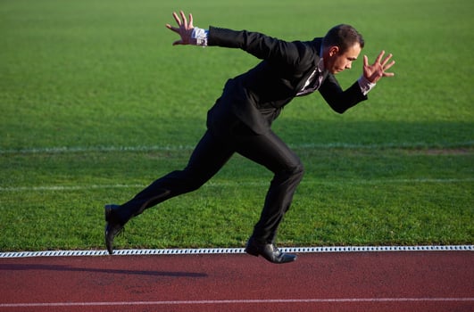 business man ready to sprint photo