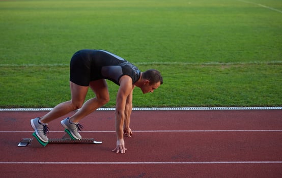 Athletic man start photo