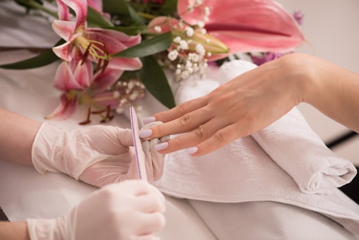 Woman hands receiving a manicure photo
