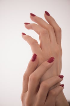 closeup of hands of a young woman photo