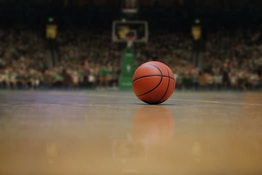 basketball ball and net on black background photo