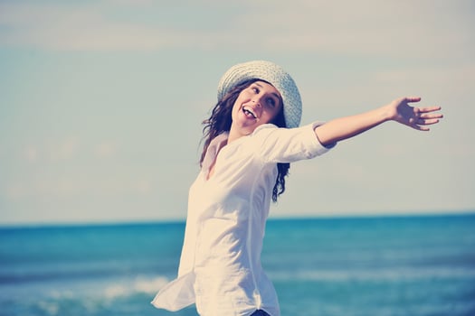 happy young woman on beach photo
