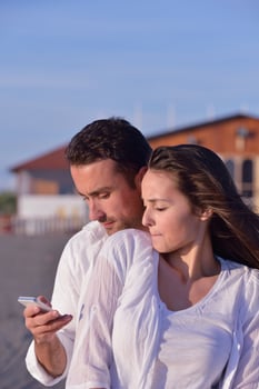 young couple  on beach have fun photo