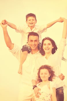 happy young family have fun on beach photo