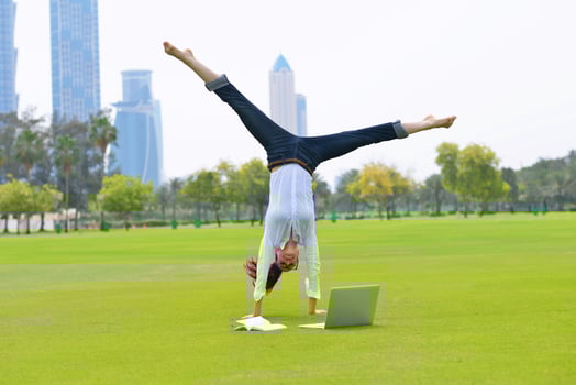 woman with laptop in park photo