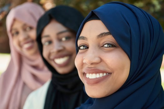 businesswoman group portrait  wearing traditional islamic clothes photo