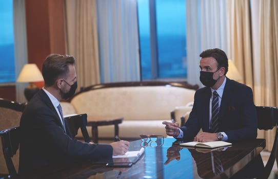 business people wearing crona virus protection face mask on meeting photo