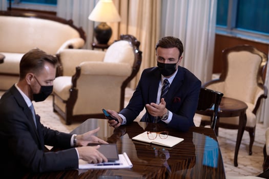 business people wearing crona virus protection face mask on meeting photo