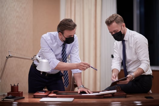 business people wearing crona virus protection face mask on meeting photo
