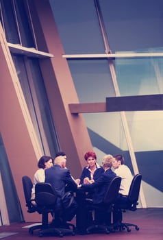business people group on meeting at modern bright office photo