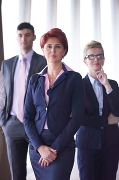 diverse business people group with redhair  woman in front photo